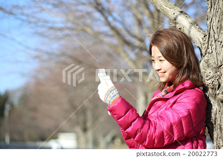 A woman in a coat A woman in a coat 20022773