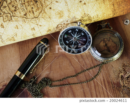 Compass on vintage map. Retro style. Compass on vintage map. Retro style. 20024611