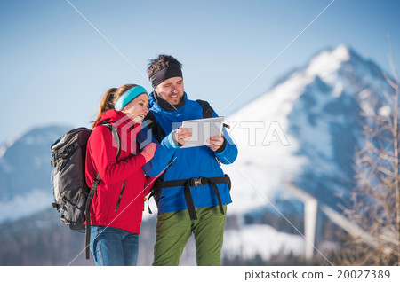 Young couple on a hike Young couple on a hike 20027389