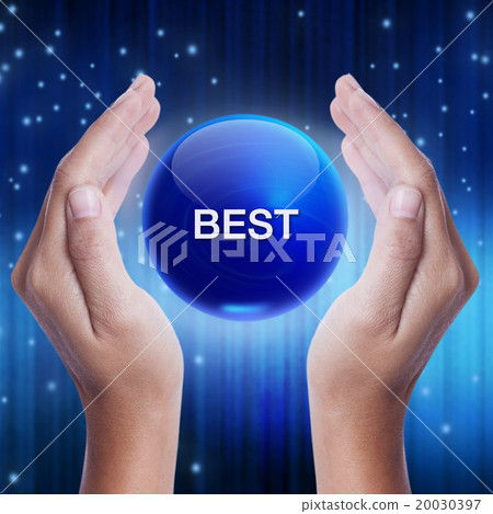 Hand showing blue crystal ball with best word. 20030397