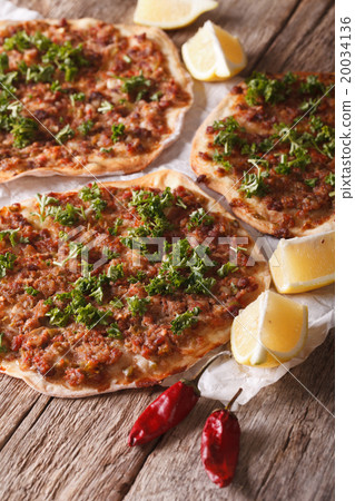 Turkish lahmacun closeup on a wooden table 20034136