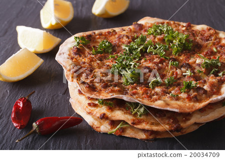 Lahmacun - Turkish pizza closeup on a table 20034709