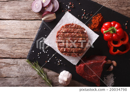 Raw burgers cutlets with the ingredients Raw burgers cutlets with the ingredients 20034798