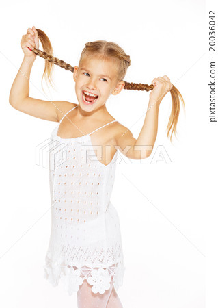 Funny little girl with pigtails Funny little girl with pigtails 20036042