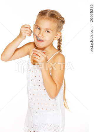 Little girl eating jello Little girl eating jello 20036256