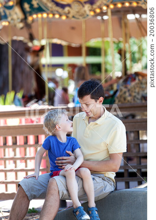 family in amusement park 20036806