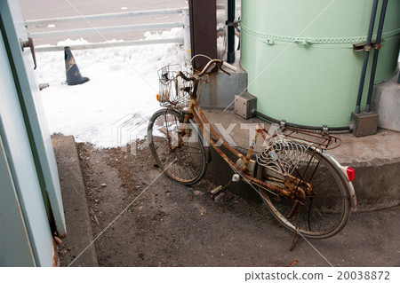 Bicycle abandoned on the roadside Bicycle abandoned on the roadside 20038872