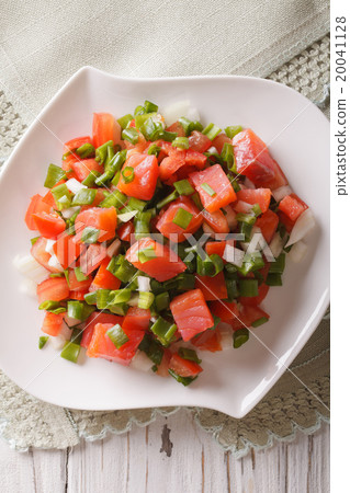 Salted salmon salad with vegetables close-up Salted salmon salad with vegetables close-up 20041128