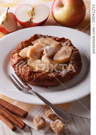 Dutch baby pancake with apples on a plate Dutch baby pancake with apples on a plate 20041253