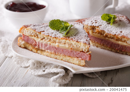 Sandwich of Monte Cristo close-up on a plate 20041475