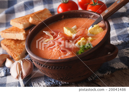 Spanish cold soup salmorejo close-up in a bowl 20041486