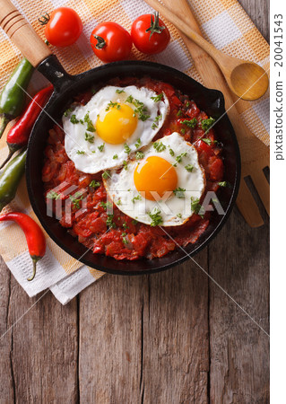 huevos rancheros closeup in the pan and ingredient huevos rancheros closeup in the pan and ingredient 20041543