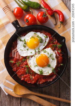 huevos rancheros closeup in the pan and ingredient huevos rancheros closeup in the pan and ingredient 20041545