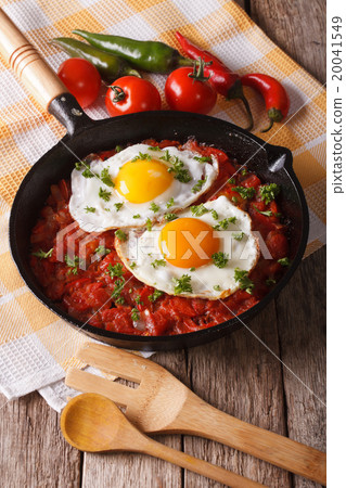 huevos rancheros closeup in the pan and ingredient huevos rancheros closeup in the pan and ingredient 20041549