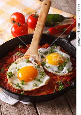 Traditional Mexican breakfast fried egg with salsa Traditional Mexican breakfast fried egg with salsa 20041553