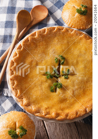 Chicken pot pie close-up on the table 20041664