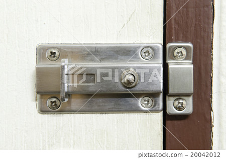 Padlock on weathered white door Padlock on weathered white door 20042012