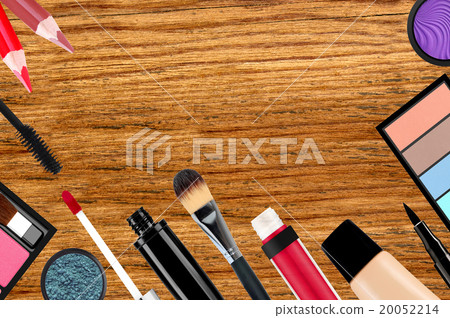 makeup brush and cosmetics over wooden background 20052214