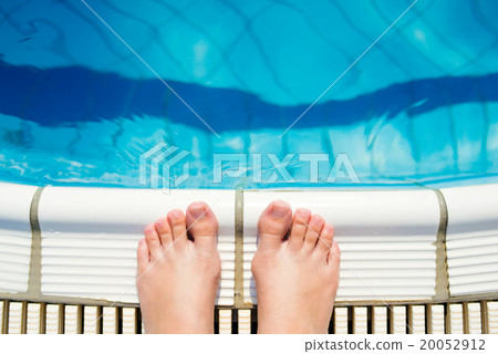 Feet at the swimming pool Feet at the swimming pool 20052912