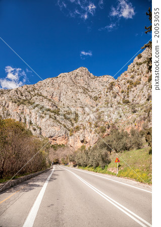 Delphi with main road against mountains in Greece 20053055