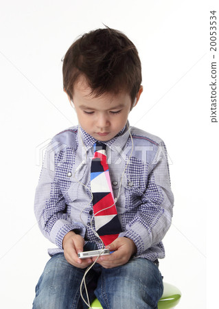 Kid with smart phone Kid with smart phone 20053534