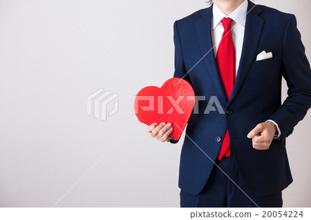 A business man with a heart shape A business man with a heart shape 20054224