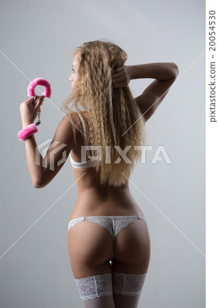 girl in handcuffs standing back. visible ass 20054530