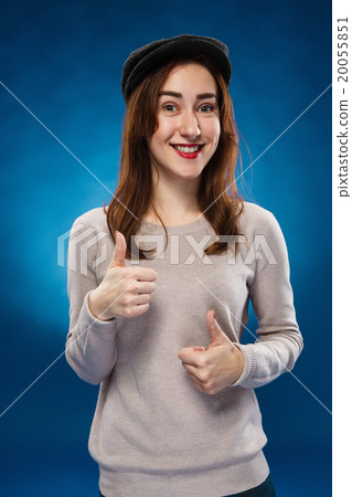 The young girl showing the ok thumbs up hand sign The young girl showing the ok thumbs up hand sign 20055851