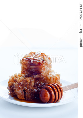 Fresh honey with honeycomb Fresh honey with honeycomb 20058448