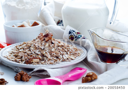 Oatmeal porridge with glass of milk Oatmeal porridge with glass of milk 20058450