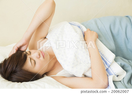 A young lady sleeping in bed A young lady sleeping in bed 20062007