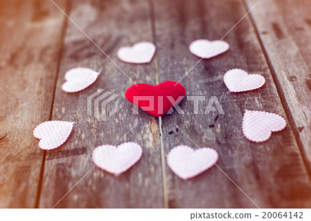Valentine hearts on wooden background  20064142