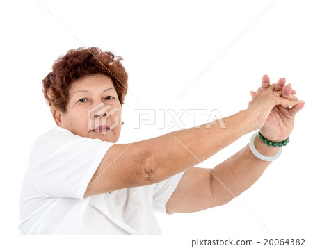 senior woman doing stretching exercise over white 20064382