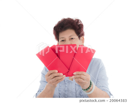 senior chinese new year holding red envelopes  20064383