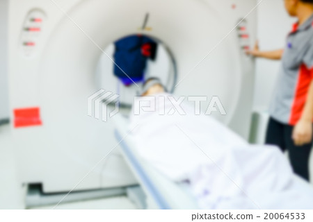 Blurry background examining patient before CT scan 20064533