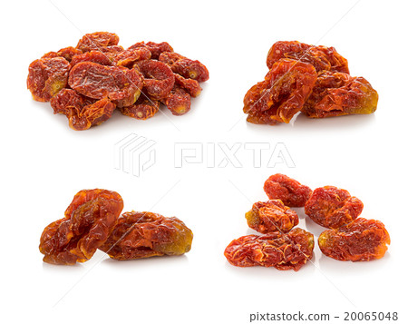 Dried tomatoes isolated on white background Dried tomatoes isolated on white background 20065048