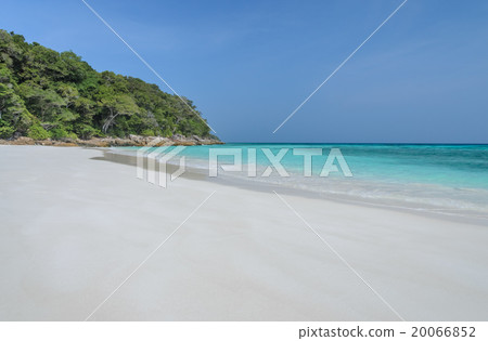 White sand beach and crystal sea water  20066852