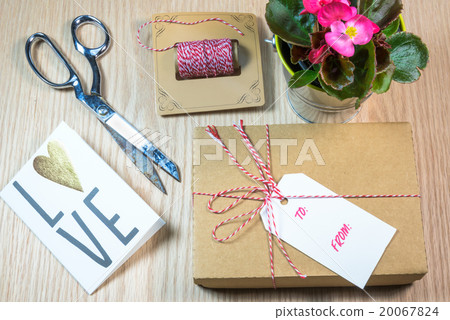Gift box,cards,Begonia on the wooden background 20067824