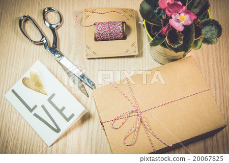 Gift box,cards,Begonia on the wooden background 20067825
