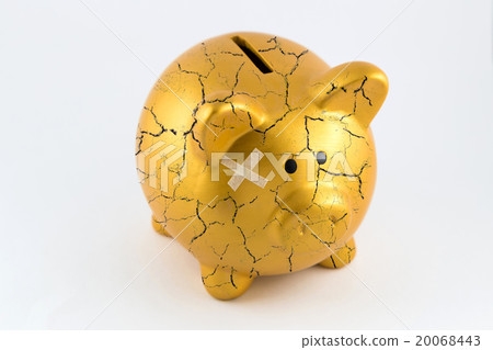 Concept of broken gold piggy bank 20068443