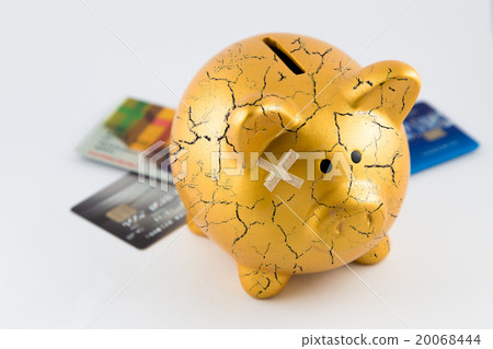 Concept of broken gold piggy bank Concept of broken gold piggy bank 20068444