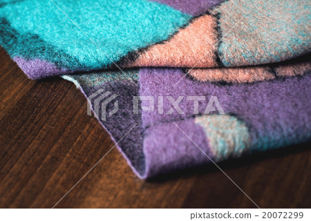 textured fabric on wooden background 20072299