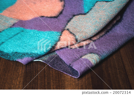 textured fabric on wooden background textured fabric on wooden background 20072314