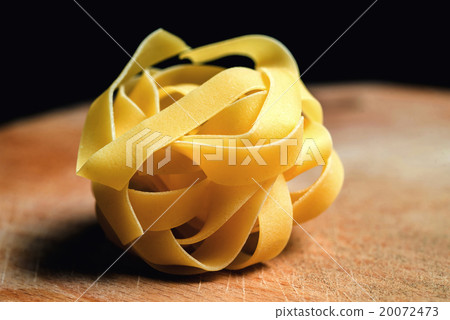 Fresh Homemade Pasta against a background Fresh Homemade Pasta against a background 20072473