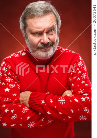 The expressive portrait on red background of a 20072641