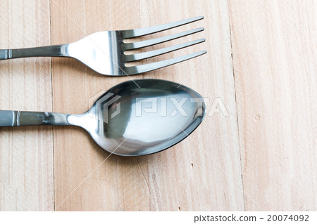 fork and spoon on wood table background 20074092
