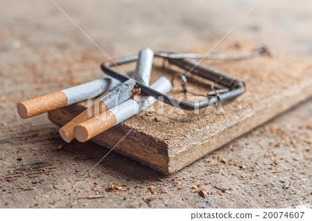 antismoking background with broken cigarettes in a