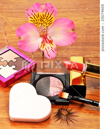 Decorative cosmetics and orchid flower 20074609