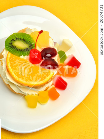 fruit cake with cream on white plate  20074731