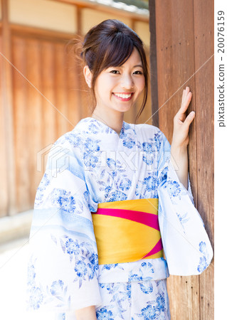 A woman in a yukata A woman in a yukata 20076159